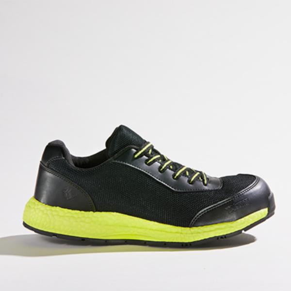 A black and yellow safety shoe with a yellow sole, providing protection and visibility in hazardous environments.