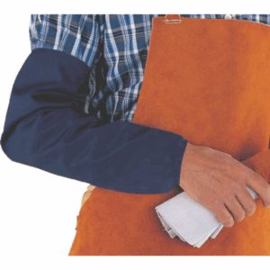 A man in an apron holds a towel.